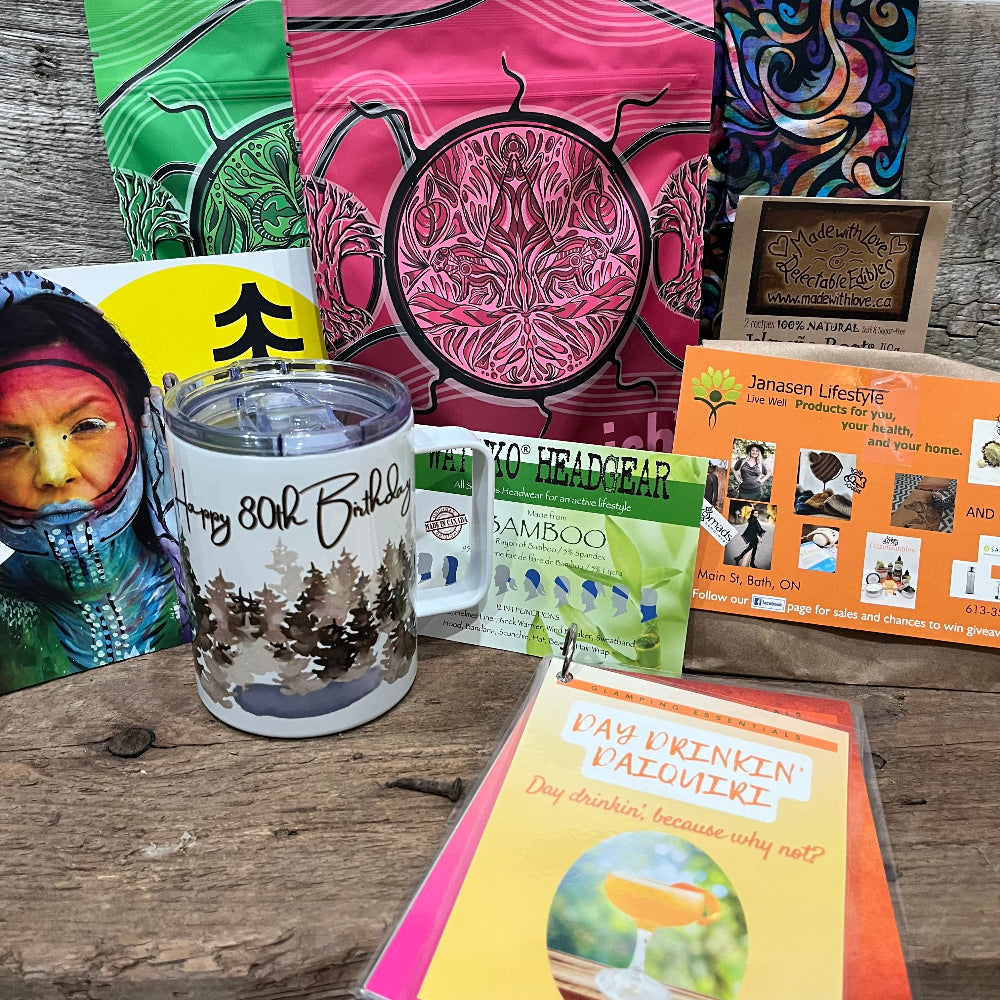 Camping Gift Box includes metal camping mug with lid, Watuko headware, biodegradable soap, tea, spices and drink recipe.