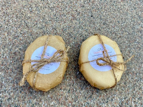 The shampoo bar and citronella soap that were included in the summer glamping box.