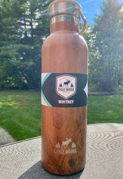 Here is the Whitney water bottle from Chilly Moose with a faux wood finish. Keeps your cold drinks cold and warm drinks warm while looking good. Designed in Canada.