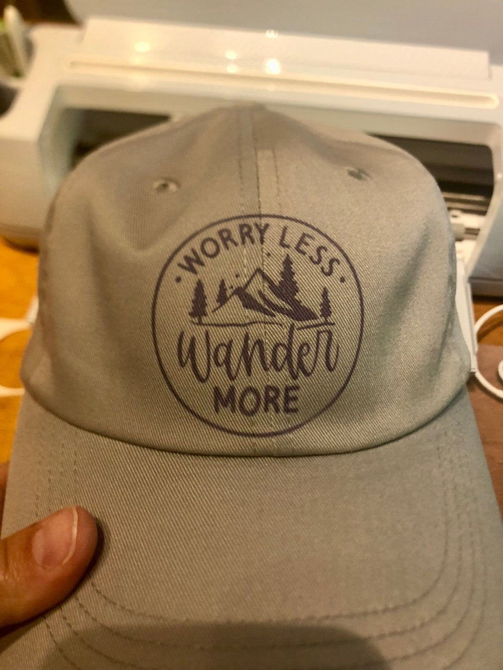 All gray cap "worry less wander more"