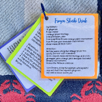 From the June Glamping Box - the complete set of drink recipe cards to date. June was Slushi Drink. The cards are laminated for longevity and held together with a metal ring to make finding the set easy!