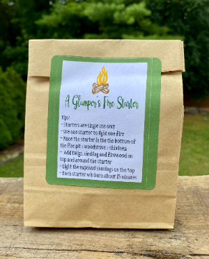 The outside packaged of our "Glamper's FIre Starters". The fire starter label includes instructions, and within are two fire starters. This was part of the August Glamping Essential's Box