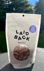 Load image into Gallery viewer, A bag of &#39;Laid Back Snacks&#39; Maple Praline Almonds.  The perfect snack after a day of hiking.
