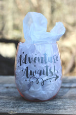 Load image into Gallery viewer, These impact resistant plastic wine tumblers are durable enough to be taken on the go, but glamorous enough to stay home (or at the cottage)!  Available in pink or clear, with the sayings &quot;One of a Kind&quot; or &quot;Adventure Awaits&quot;, we say ... get both!
